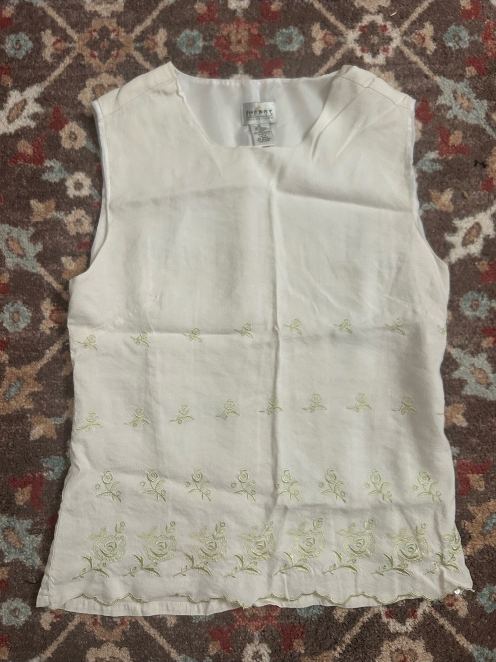 White Sleeveless Embroidered Top with Green Floral Accent